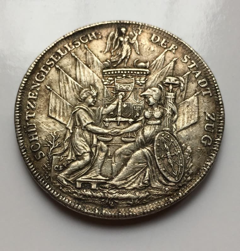 Silberne Schützenmedaille mit der Stadtansicht von Zug und der Umschrift TUGIUM