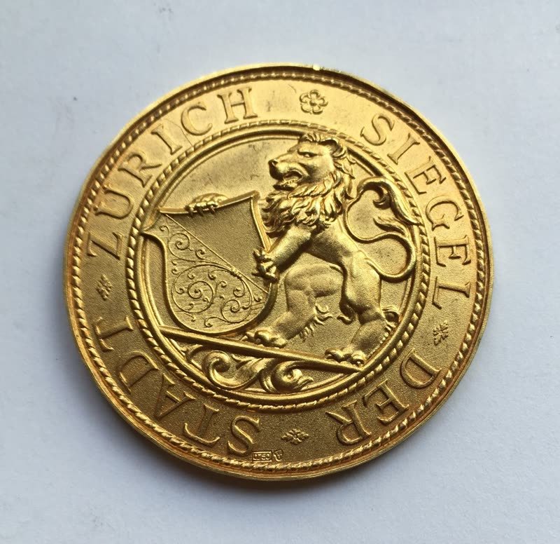 Goldene Schützenmedaille mit einem Bogenschützen, Umschrift «Schweiz. Landesausstellungs-Schiessen Zürich Albisgütli 1939»